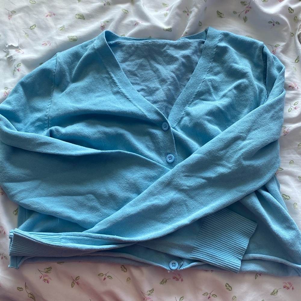 Blue cardigan barley worn